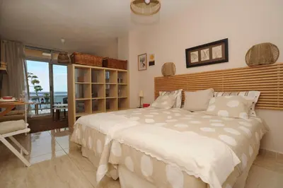 Cama o camas de una habitación en El Rincón de Inés - Las Canteras Beachfront