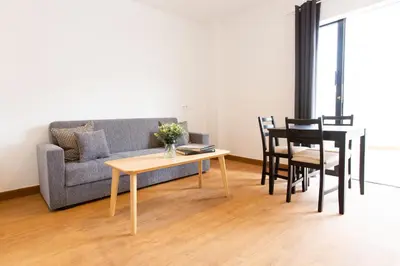 Zona de estar de Loft Matilde by Grupo Matilde