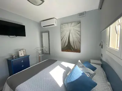 Cama o camas de una habitación en Apartamento Oasis Palmeras 4