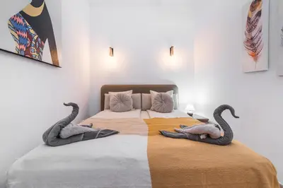 Cama o camas de una habitación en Moser Living Premium Apartments - Puerto Rico
