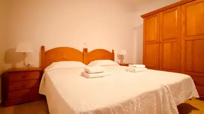 Cama o camas de una habitación en Comfortable flat close to the beach