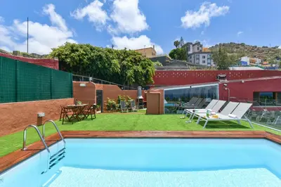 Piscina en o cerca de La Casa de Arriba Arucas by VillaGranCanaria