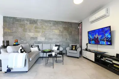 Una televisión o centro de entretenimiento en Salobre Par 4 N 14