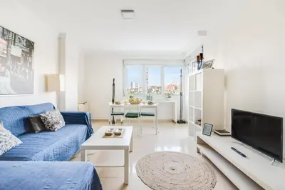 Una televisión o centro de entretenimiento en Home2Book Comfy Apartment Rambla