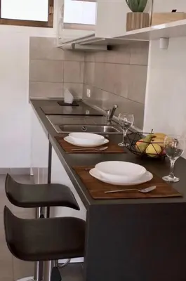 Una cocina o zona de cocina en Apartamento Robi en Cumana II - Puerto Rico - Ap 508