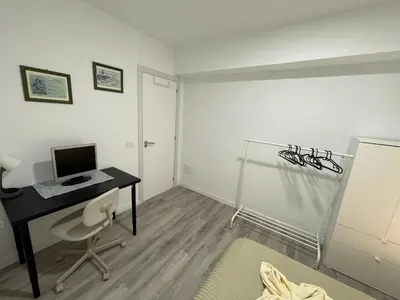 Una televisión o centro de entretenimiento en CoLiving El Toro