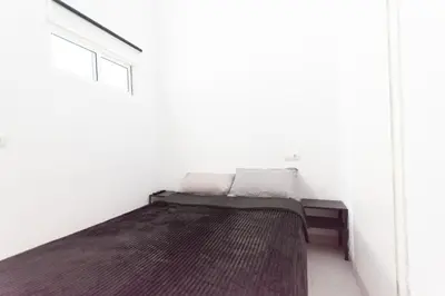 Cama o camas de una habitación en Piso Reformado