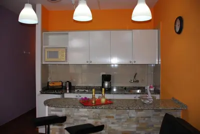 Una cocina o zona de cocina en Apartamentos Las Dunas