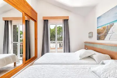 Cama o camas de una habitación en Sweet Holidays