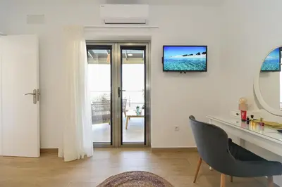 Una televisión o centro de entretenimiento en Apartamento Starlight La Aldea II
