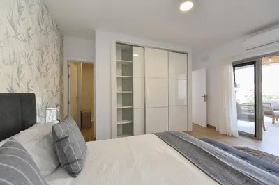 Cama o camas de una habitación en Apartamento Starlight La Aldea II