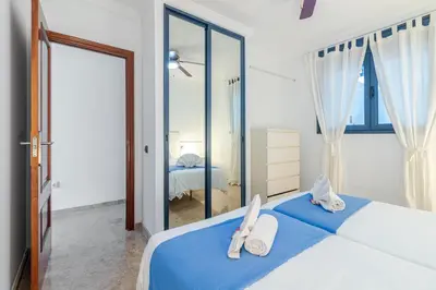 Cama o camas de una habitación en Ocean & Auditorium Views