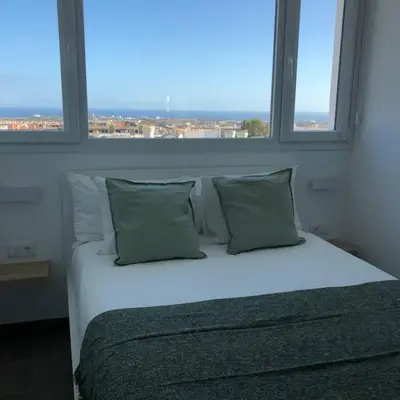 Cama o camas de una habitación en Blanco Homes & Living 2 by SunHousesCanarias