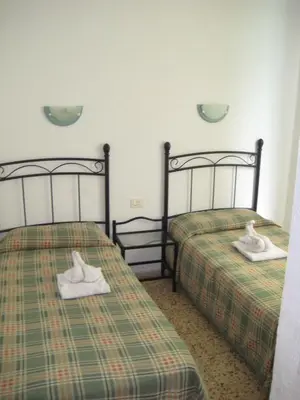 Cama o camas de una habitación en Bungalows Boston