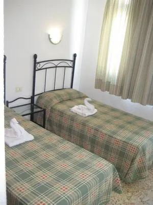Cama o camas de una habitación en Bungalows Boston