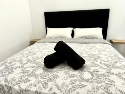 Cama o camas de una habitación en Loft Deluxe Aeropuerto
