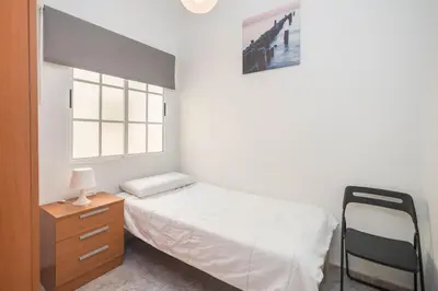 Cama o camas de una habitación en 3BR Urban Flat - Centric & Confortable
