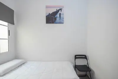 Cama o camas de una habitación en 3BR Urban Flat - Centric & Confortable