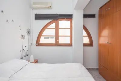 Cama o camas de una habitación en 3BR Urban Flat - Centric & Confortable