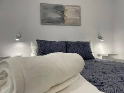 Cama o camas de una habitación en SAN AGUSTIN SEAVIEW BLUE APARTMENT