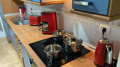 Una cocina o zona de cocina en MARTSARAs PISCINA SARDINA