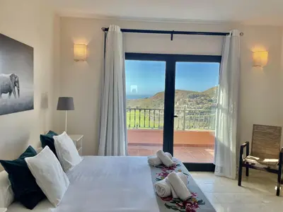Cama o camas de una habitación en HomeForGuest Villa 10 in Salobre Golf with great views to the golf course
