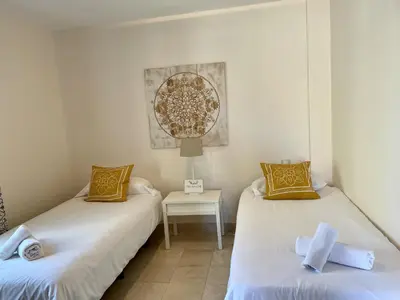 Cama o camas de una habitación en HomeForGuest Villa 10 in Salobre Golf with great views to the golf course