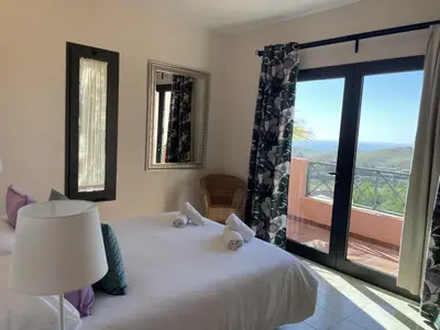 Cama o camas de una habitación en HomeForGuest Villa 7 in Salobre Golf with nice views to the mountains