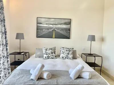 Cama o camas de una habitación en HomeForGuest Villa 5 in Salobre Golf with private pool, garden and great views