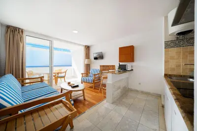 Una cocina o zona de cocina en Aparthotel Maracaibo