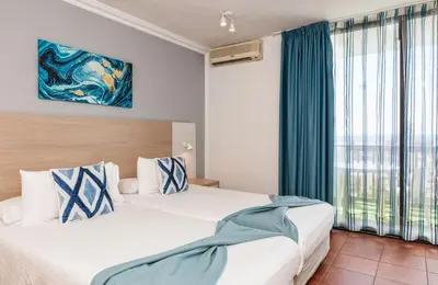 Cama o camas de una habitación en Hotel Folias San Agustín