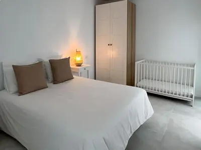 Cama o camas de una habitación en Modern Sea Front Retreat