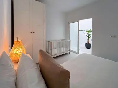 Cama o camas de una habitación en Modern Sea Front Retreat