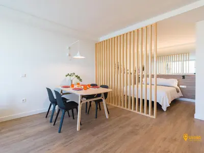 Cama o camas de una habitación en Living Las Canteras Homes - STYLISH BEACHFRONT