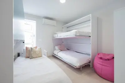 Cama o camas de una habitación en La Dolce Vita - Villa familiar con piscina privada