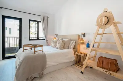 Cama o camas de una habitación en Luxury Beach - Heated pool & Beachfront access