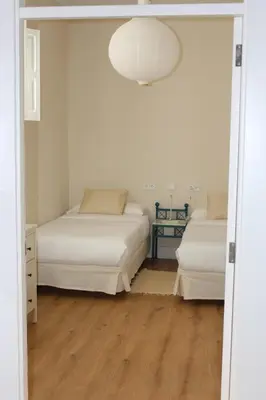 Cama o camas de una habitación en La Casona de Galdós