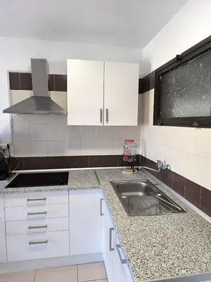 Una cocina o zona de cocina en Sea view cozy apartment with pool