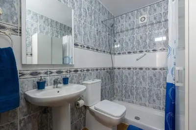 Un baño de HomeForGuest A piece of oasis in the South of Gran Canaria