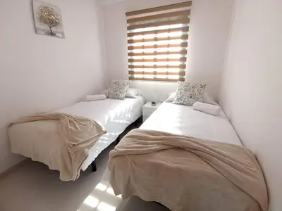Cama o camas de una habitación en Sunset Faro Vibbecanarias Sonnenland