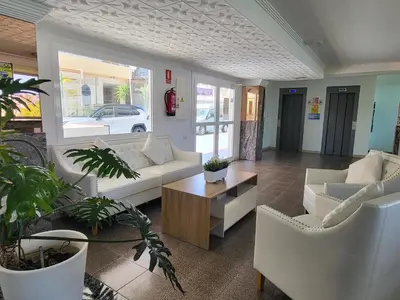 Zona de estar de Las Camelias Apartments