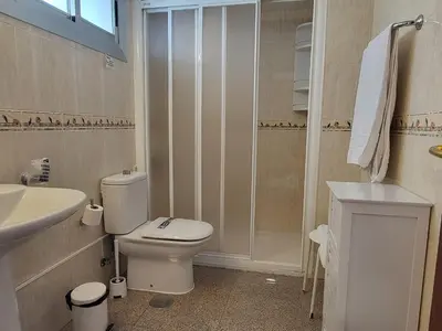 Un baño de Las Camelias Apartments