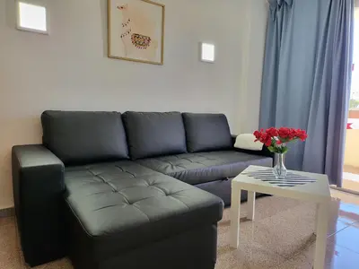 Zona de estar de Las Camelias Apartments