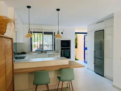Una cocina o zona de cocina en Meloneras Garden Suite