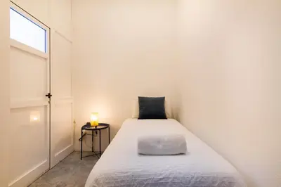 Cama o camas de una habitación en Bungalow con jardín en Pasito PM40
