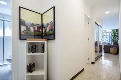 Una televisión o centro de entretenimiento en Puccini Oasis - Tosca