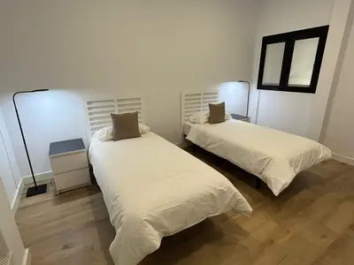 Cama o camas de una habitación en Luxury Seaview Apartment Las Canteras