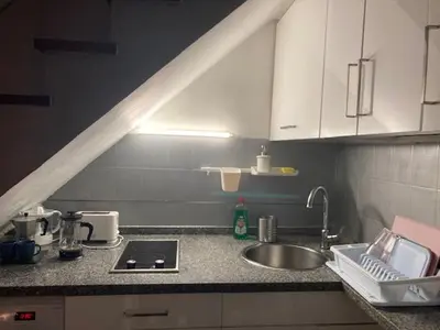 Una cocina o zona de cocina en Dúplex Maspalomas