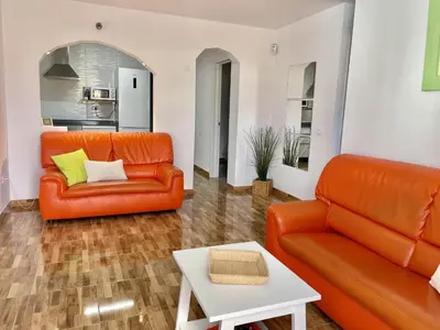 Zona de estar de HomeForGuest Amplio apartamento con piscina y terraza en Mogan