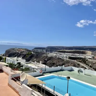 HomeForGuest Amplio apartamento con piscina y terraza en Mogan